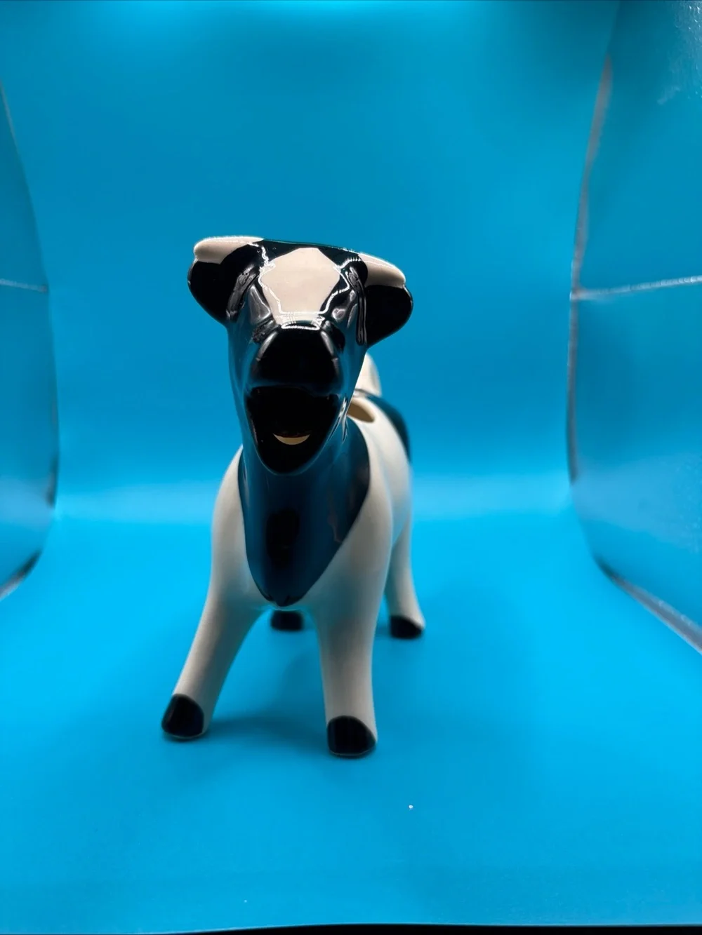 Glossy Black & White Ceramic Cow Creamer Figurine